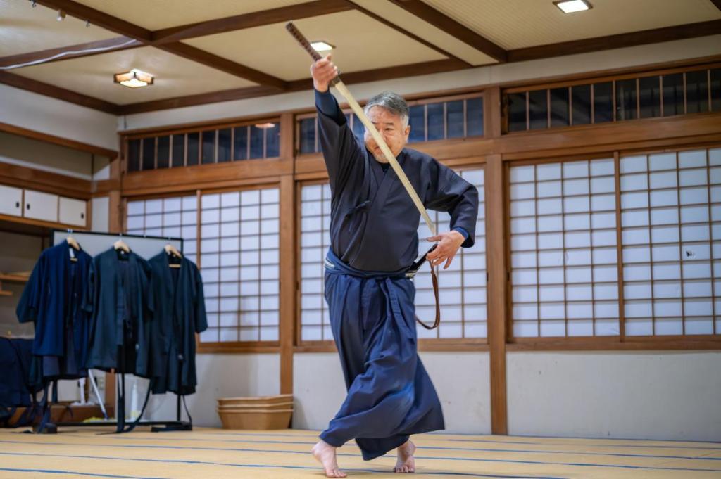 An instructor demonstrating a sword strike in the dojo